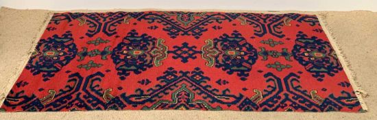 VINTAGE WOOLLEN RUG, red and blue with central repeating pattern, 92 x 192cms