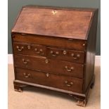 GEORGIAN MAHOGANY BUREAU the top with fitted interior and sliding well above two short and two