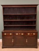 GEORGE IV WELSH OAK DRESSER having a three shelf rack over a base of three drawers and three