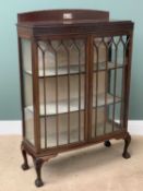 BOW FRONTED CHINA CABINET with Grecian style detail having a railback, twin glazed doors, on ball