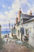 WARREN WILLIAMS ARCA watercolour - seaside cottages with numerous figures and woman feeding poultry,