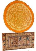 REPRODUCTION KELIM RUG WITH LABEL and a circular woollen rug, 135 x 72cms and 120cms diameter,