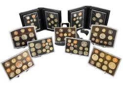 UNITED KINGDOM COIN PROOF SETS (9) - in original presentation cases and boxes including 7 x standard