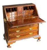 REPRODUCTION MAHOGANY APPRENTICE TYPE FALL FRONT BUREAU - having a serpentine well fitted interior