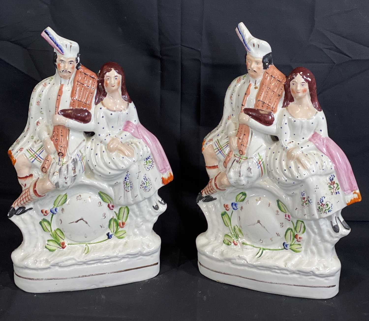 STAFFORDSHIRE POTTERY COUPLE FLATBACK FIGURINES (2) - with front clock detail, 35cms H - Image 2 of 2