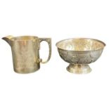 VICTORIAN SILVER MILK JUG and a Dutch style white metal pedestal bowl, the jug Sheffield 1876,