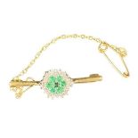 9CT GOLD DIAMOND & EMERALD CLUSTER BAR BROOCH - 2.4grms, 3cms across, with safety chain and pin