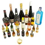 ALCOHOL - an assortment of Gin Liqueur, wine bottles, also a quantity of miniatures