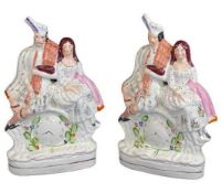 STAFFORDSHIRE POTTERY COUPLE FLATBACK FIGURINES (2) - with front clock detail, 35cms H