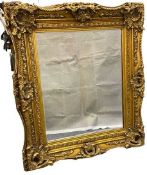 REPRODUCTION GILT FRAMED WALL MIRROR - with bevelled edged glass, 79cms H, 87cms W