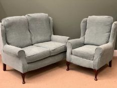 WINGBACK TWO SEATER SOFA & MATCHING ARMCHAIR - floral decorated with slip over plain covers,