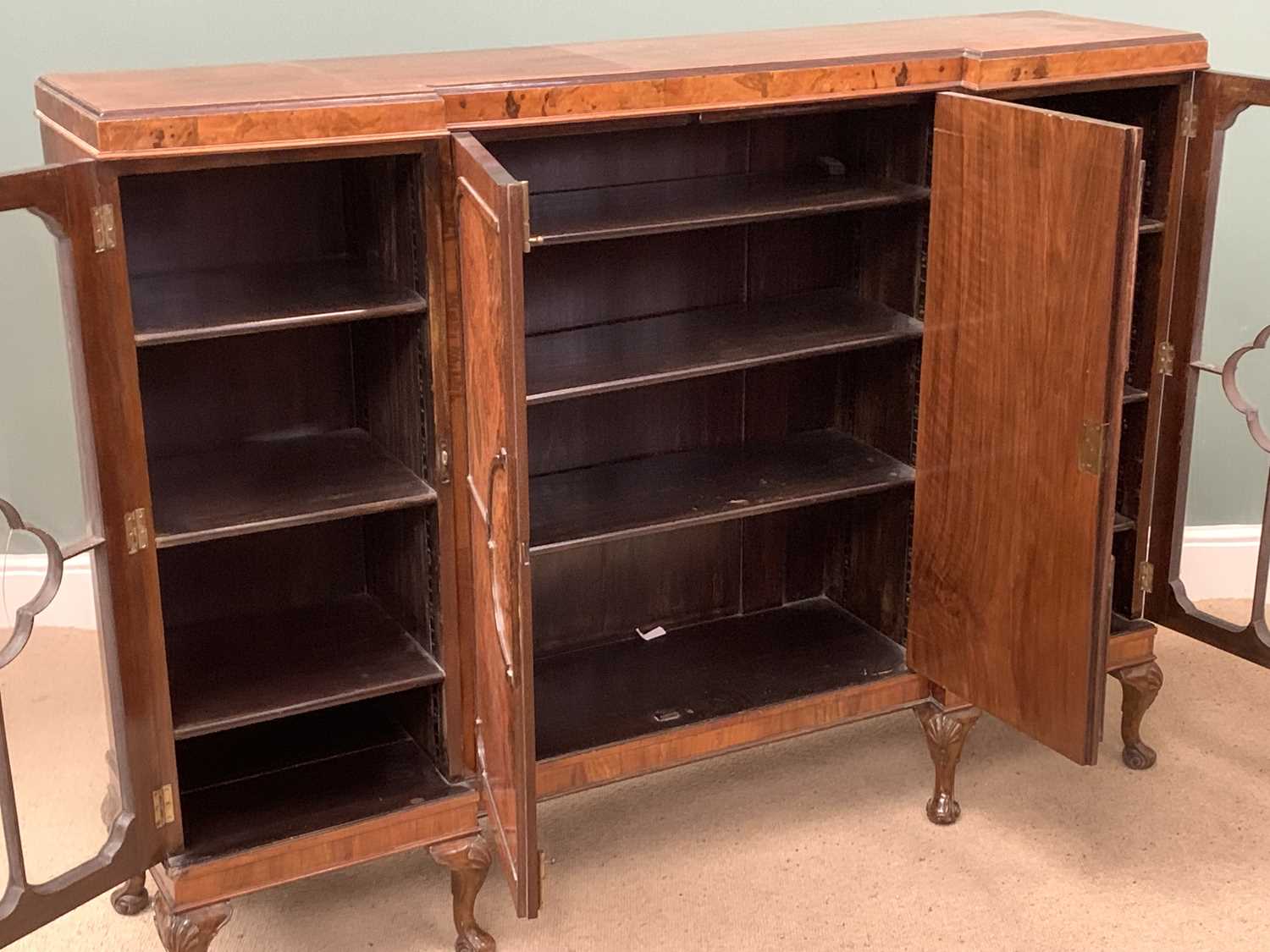 QUEEN ANNE TYPE FIGURED WALNUT BOOKCASE having inverted breakfront with two door central section - Image 2 of 3