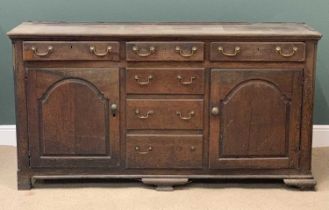 19th CENTURY OAK DRESSER BASE having three drawers over three false central drawers and two side