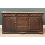 19th CENTURY OAK DRESSER BASE having three drawers over three false central drawers and two side