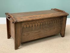 VINTAGE OAK BLANKET BOX with pegged joints, arched top and carvings to the front, 48cms H, 104cms W,