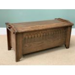 VINTAGE OAK BLANKET BOX with pegged joints, arched top and carvings to the front, 48cms H, 104cms W,