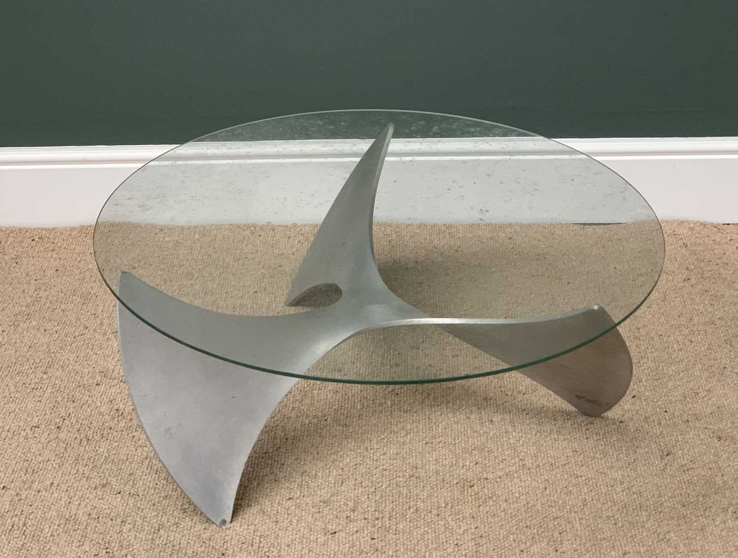 CONTEMPORARY COFFEE TABLE with glass top and propellor shaped alloy? base, 32cms H, 77cms diameter