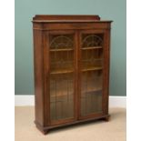 ANTIQUE OAK VINTAGE BOOKCASE CUPBOARD with twin leaded glass doors and railback, 131cms H, 92cms