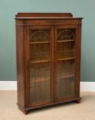 ANTIQUE OAK VINTAGE BOOKCASE CUPBOARD with twin leaded glass doors and railback, 131cms H, 92cms