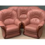 MODERN THREE PIECE SUITE, terracotta colour leather effect and wood, the sofa 97cms H, 200cms W,