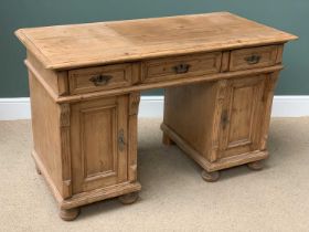 ANTIQUE PINE TWIN PEDESTAL DESK having three drawers over twin pedestal cupboards, 82cms H, 131cms
