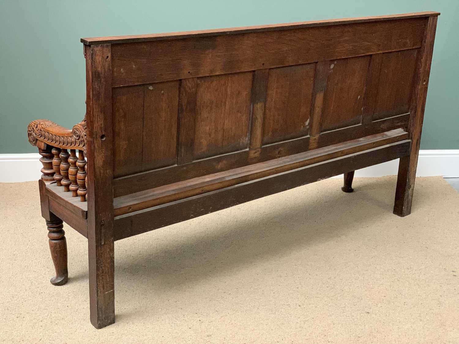 19th CENTURY OAK BENCH with a five fielded panel back, carved arms with bobbin supports, on turned - Image 3 of 5