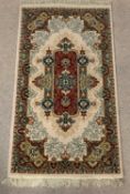PERSIAN TYPE MULTI-COLOURED RUG with central diamond pattern, 160 x 85cms
