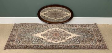 PERSIAN TYPE RUG with central diamond motif, labelled 'Wilton', 92 x 182cms and an oval mahogany