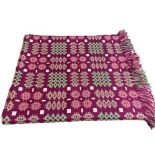 TRADITIONAL WELSH WOOLLEN BLANKET - ground burgundy with greens and whites, etc, tasselled ends, 150