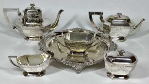 5 PIECE SILVER PLATED TEA SERVICE - on a non-associated circular four footed tray