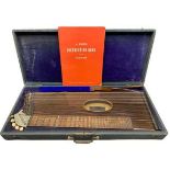 LOT WITHDRAWN - CASED GERMAN MADE ROSEWOOD ZITHER - with boxwood stringing and ivory tuning knobs,