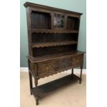 CIRCA 1930 OAK POTBOARD DRESSER, the three shelf rack having an upper glazed central door and the