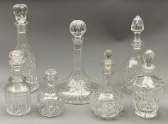 CUT & OTHER GLASS DECANTERS WITH STOPPERS (7) - in various shapes and sizes including a ship's