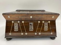 ROSEWOOD SARCOPHAGUS SHAPED WORKBOX - a fine example with mother of pearl inlay, fitted interior, on