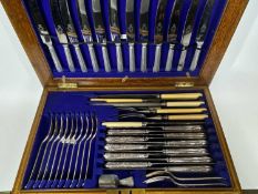 OAK TABLE CANTEEN OF CUTLERY and a further oak cased quantity of fish and other knives and forks,