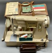 VINTAGE SINGER ELECTRIC SEWING MACHINE WITH FOOT PEDAL - booklets and attachements in a canvas carry