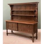 DRESSER - reproduction oak the upper section having a two shelf rack with panelled back, the base