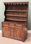 18th CENTURY OAK CONWY VALLEY DRESSER having a three shelf pot belly rack with shaped cornice, the