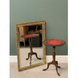 BEVELLED GLASS WALL MIRROR in a gilt frame, 100 x 71cms and a tooled top tripod base wine table,