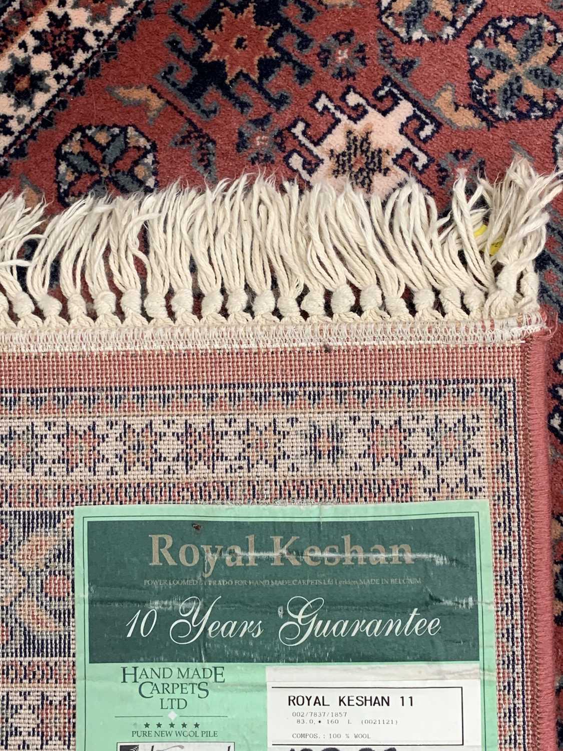 ROYAL KESHAN RUG - red ground with multi-border and Aztec/geometric design, 83 x 160cms - Image 2 of 2
