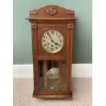 POLISHED OAK PENDULUM WALL CLOCK with silvered dial, eight day movement with Westminster chime,