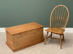 MODERN PINE BLANKET BOX, 49cms H, 96cms W, 49cms D and a hoop backed Windsor type chair, 103cms H,