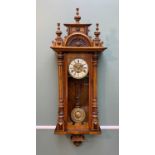 EARLY 20TH CENTURY CONTINENTAL WALNUT VIENNA STYLE WALL CLOCK, carved pediment, fluted pilasters and