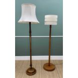 TWO TURNED WALNUT & TURNED TEAK STANDARD LAMPS (2)