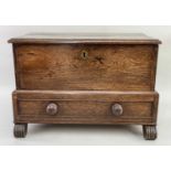 WELSH OAK COFFER BACH, moulded hinged lid, plain sides, fitted long drawer, on later reeded and