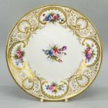 NANTGARW PORCELAIN PLATE circa 1818-1820, London decorated with elaborate border in gold featuring