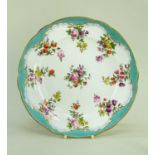 NANTGARW PORCELAIN PLATE circa 1818-1820, slightly wavy border, having a solid gilt rim, turquoise