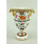 RARE SWANSEA PORCELAIN GRYPHON HANDLED VASE circa 1815-1817, campana shaped, having a flared rim,