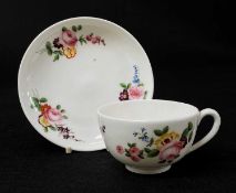 NANTGARW PORCELAIN CUP & SAUCER circa 1813-1820, of simple form, finely painted with sprays of roses