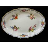 NANTGARW PORCELAIN OVAL DISH circa 1818-1820, of lobed form, painted with a formal arrangement of